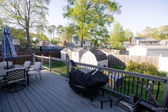 9522 Broad Meadows Rd, Glen Allen, VA 23060 - wooden terrace with a storage unit, a residential view, a fenced backyard, and an outdoor structure