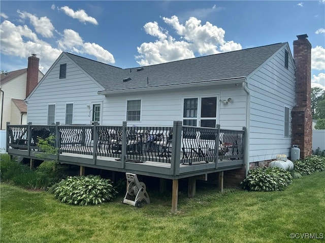 9522 Broad Meadows Rd, Glen Allen, VA 23060 - back of house with a shingled roof, a lawn, a deck, and a chimney