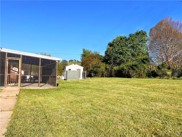 view of yard with a sunroom