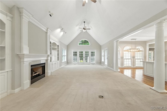 132 Warwick Hls, Williamsburg, VA 23188 - unfurnished living room with a ceiling fan, light colored carpet, a fireplace with flush hearth, built in shelves, and a chandelier