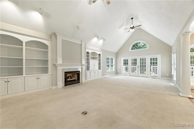 132 Warwick Hls, Williamsburg, VA 23188 - unfurnished living room with a ceiling fan, a fireplace with flush hearth, light colored carpet, high vaulted ceiling, and built in features