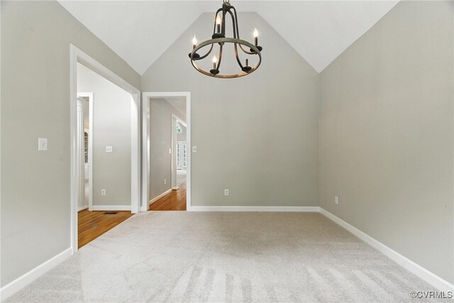 132 Warwick Hls, Williamsburg, VA 23188 - carpeted empty room featuring a chandelier and high vaulted ceiling
