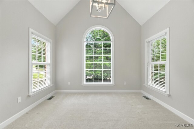 132 Warwick Hls, Williamsburg, VA 23188 - spare room featuring lofted ceiling, a chandelier, and carpet