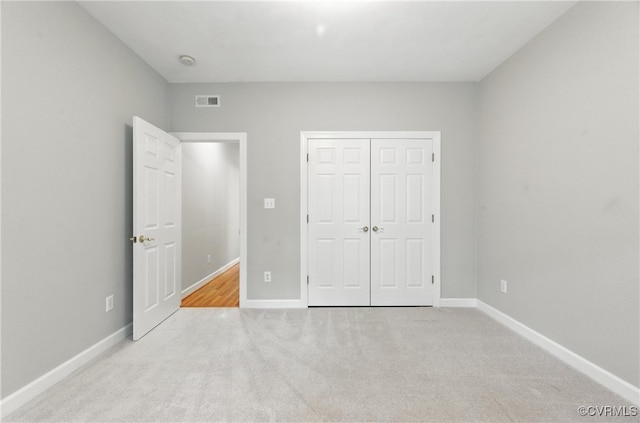 132 Warwick Hls, Williamsburg, VA 23188 - unfurnished bedroom featuring carpet flooring and a closet