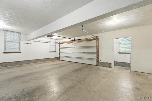 132 Warwick Hls, Williamsburg, VA 23188 - garage featuring a garage door opener