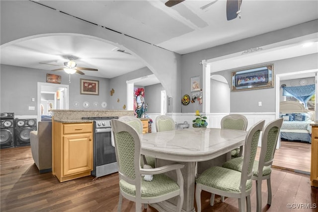 32390 S Main St, Boykins, VA 23827 - dining area featuring a ceiling fan, arched walkways, and a wainscoted wall