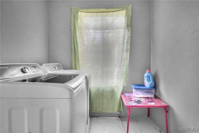 32390 S Main St, Boykins, VA 23827 - clothes washing area featuring separate washer and dryer, marble finish floor, and laundry area