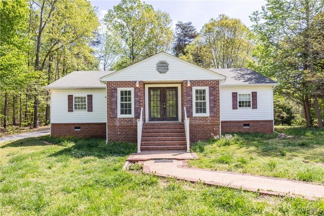 view of front of home with french doors, crawl space, a front lawn, and entry steps