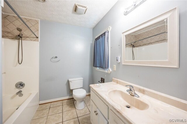 bathroom with tile patterned floors, vanity, shower / washtub combination, toilet, and visible vents