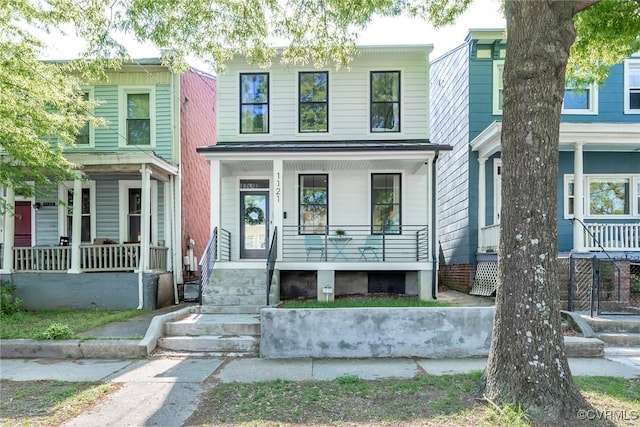 view of front of home featuring covered porch