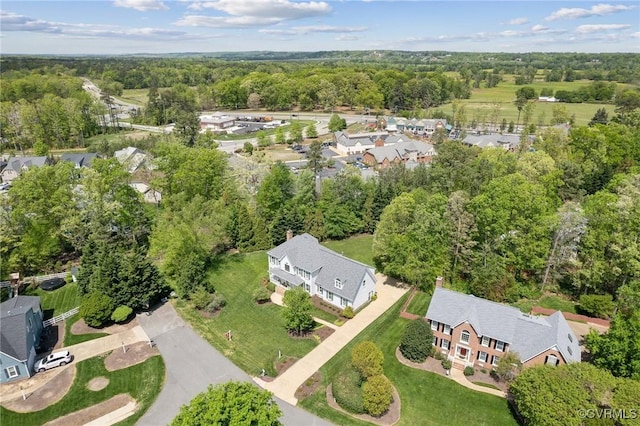 aerial view with a wooded view