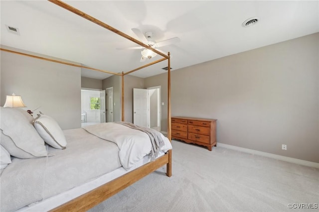 bedroom with baseboards, carpet, a ceiling fan, and visible vents