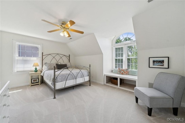 bedroom featuring baseboards, carpet floors, and vaulted ceiling