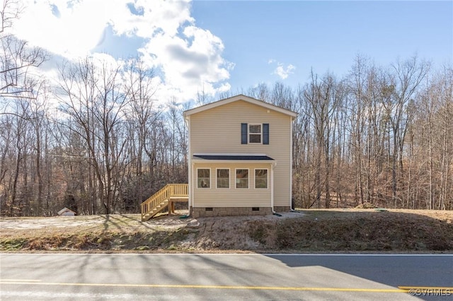 view of side of home with crawl space