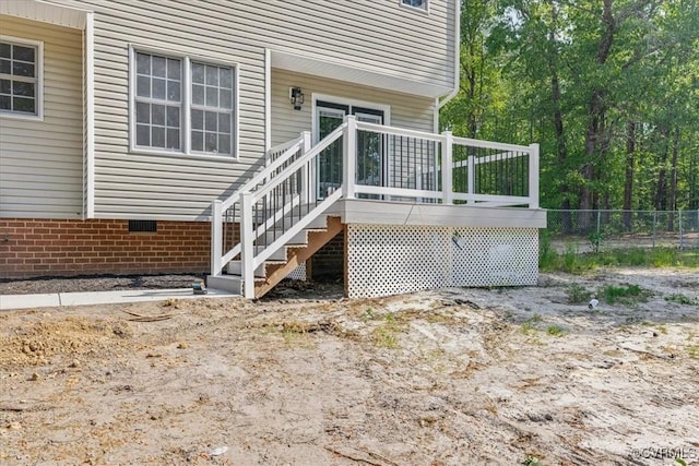 6013 Linden Ln, Disputanta, VA 23842 - property entrance with crawl space and a wooden deck