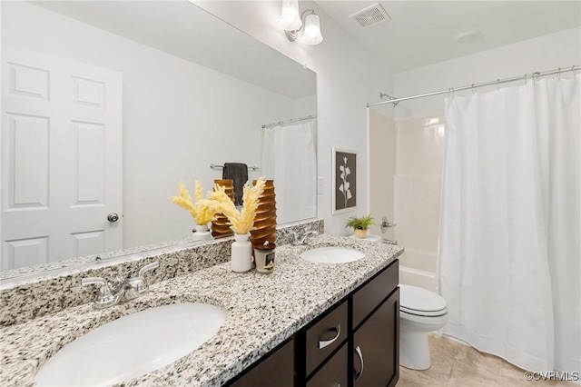 7931 Lyndale Dr, Chesterfield, VA 23235 - full bathroom with double vanity, toilet, shower / tub combo, and tile patterned floors