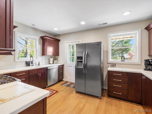 1612 Brookland Pkwy, Richmond, VA 23227 - kitchen with appliances with stainless steel finishes, a sink, healthy amount of natural light, light wood-style flooring, and recessed lighting