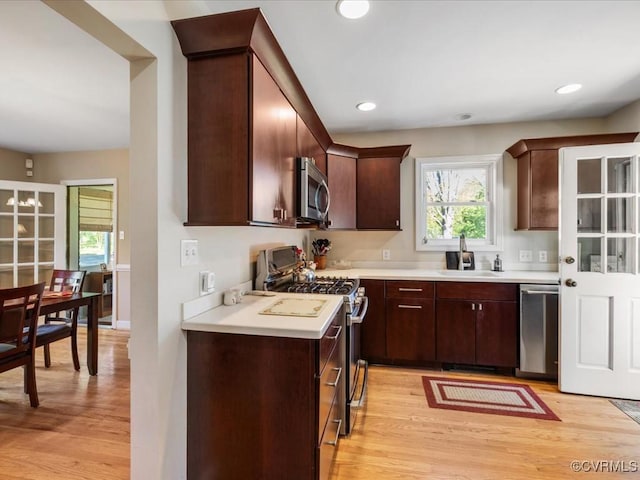 1612 Brookland Pkwy, Richmond, VA 23227 - kitchen with appliances with stainless steel finishes, light wood-style flooring, light countertops, and recessed lighting
