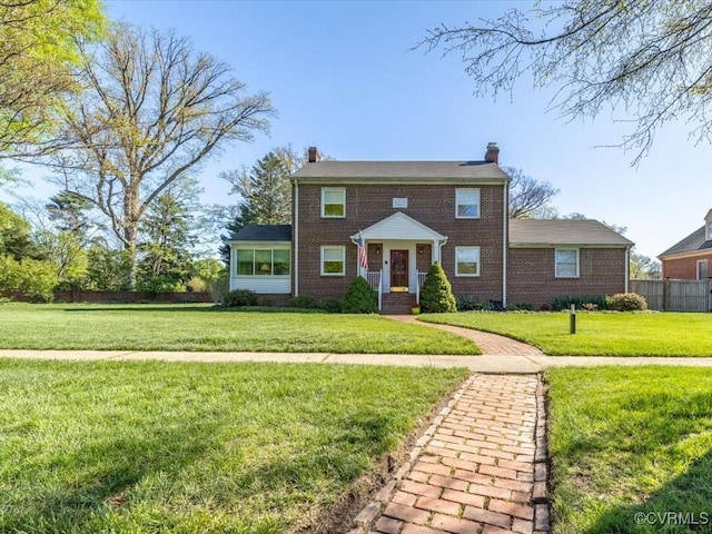 1612 Brookland Pkwy, Richmond, VA 23227 - view of front of home with a chimney and brick siding