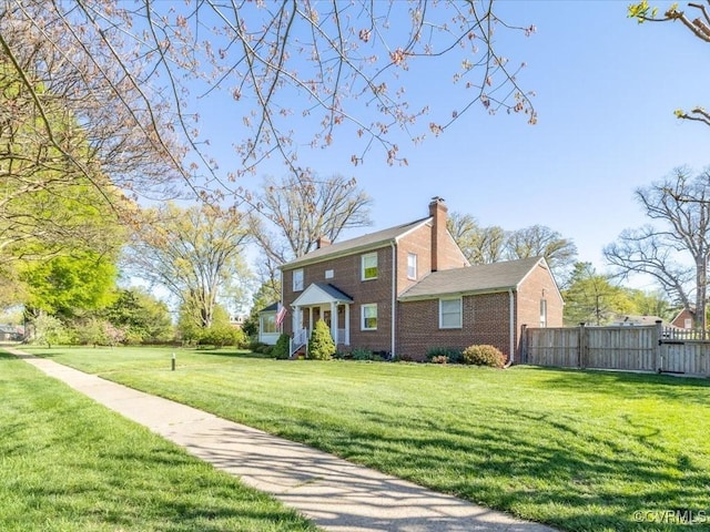 1612 Brookland Pkwy, Richmond, VA 23227 - view of front of house with a chimney and brick siding