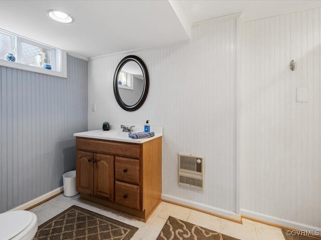 1612 Brookland Pkwy, Richmond, VA 23227 - bathroom with heating unit, tile patterned floors, vanity, toilet, and baseboards