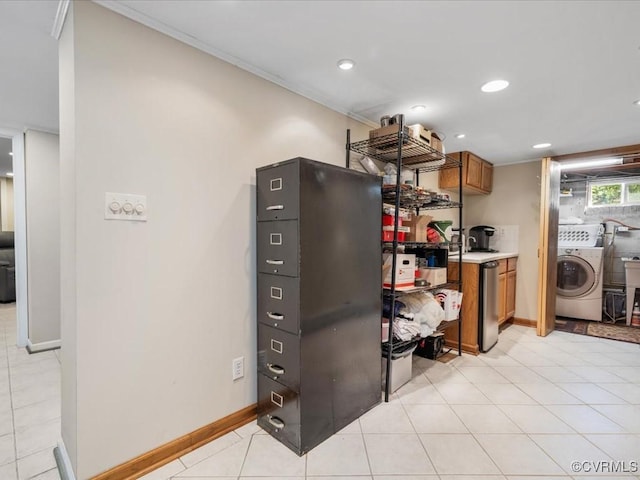 1612 Brookland Pkwy, Richmond, VA 23227 - kitchen featuring washer / clothes dryer, brown cabinetry, light countertops, ornamental molding, and baseboards