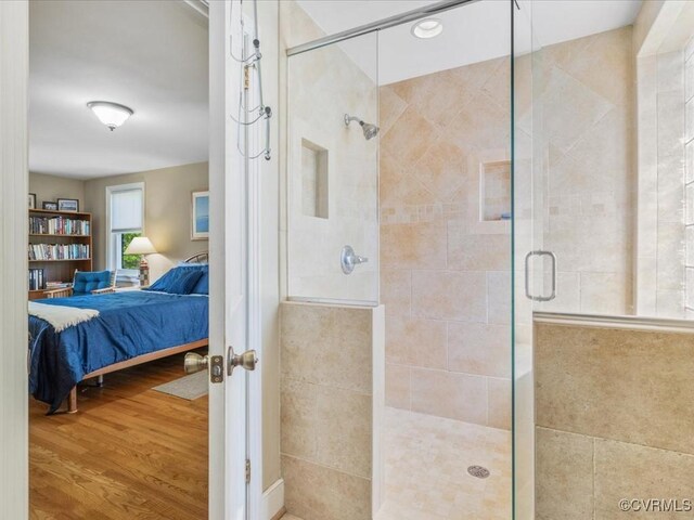 1612 Brookland Pkwy, Richmond, VA 23227 - bathroom featuring ensuite bathroom, a stall shower, and wood finished floors