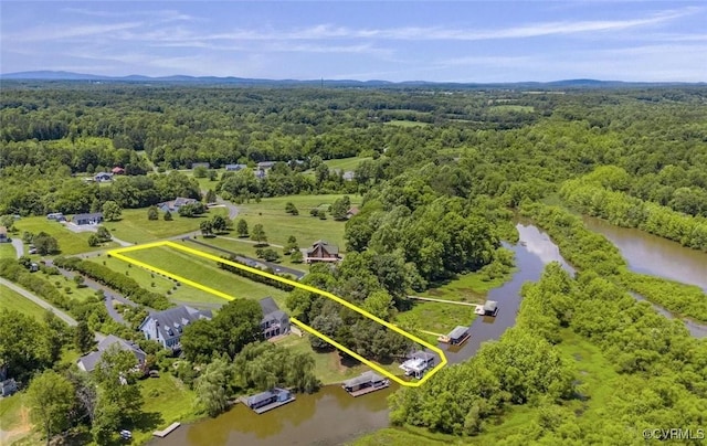 26437 Pennfields Dr, Orange, VA 22960 - view of property location with a heavily wooded area, property parcel outlined, and a nearby body of water