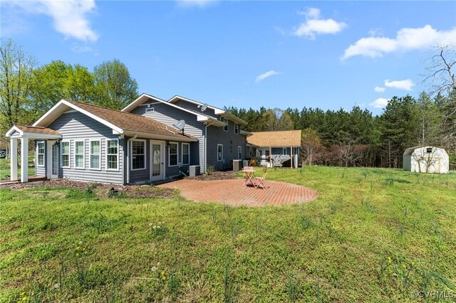 1474 Welsh Tract Rd, Charlotte Courthouse, VA 23923 - back of house featuring a storage shed and a yard