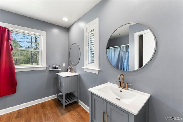 1474 Welsh Tract Rd, Charlotte Courthouse, VA 23923 - bathroom featuring wood finished floors and two vanities