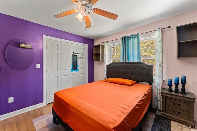 1474 Welsh Tract Rd, Charlotte Courthouse, VA 23923 - bedroom with wood finished floors, a closet, and a ceiling fan
