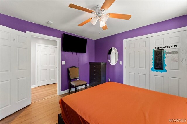 1474 Welsh Tract Rd, Charlotte Courthouse, VA 23923 - bedroom with light wood-style flooring, ceiling fan, and a closet