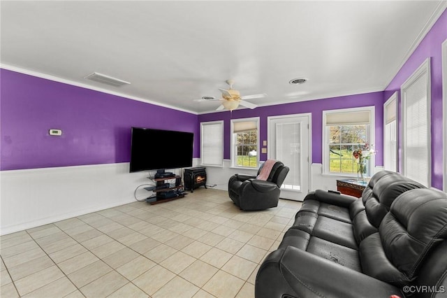 1474 Welsh Tract Rd, Charlotte Courthouse, VA 23923 - living room with light tile patterned floors, crown molding, a ceiling fan, and wainscoting