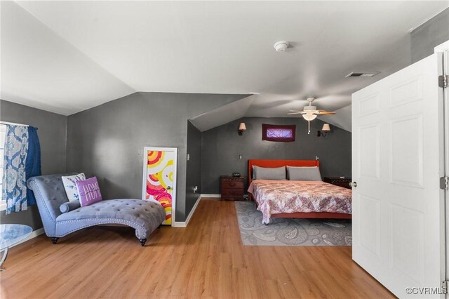 1474 Welsh Tract Rd, Charlotte Courthouse, VA 23923 - bedroom with vaulted ceiling, light wood-style floors, and ceiling fan