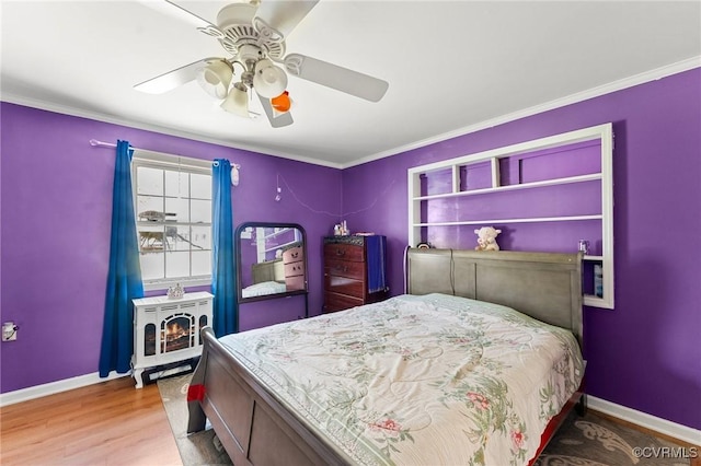 1474 Welsh Tract Rd, Charlotte Courthouse, VA 23923 - bedroom featuring wood finished floors, a ceiling fan, and crown molding