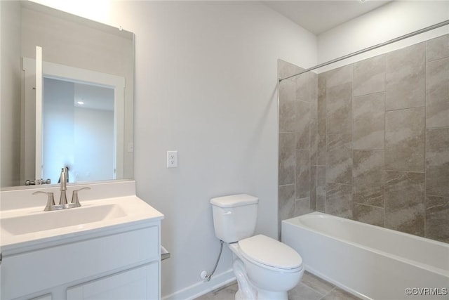 full bathroom featuring toilet, baseboards, shower / washtub combination, and vanity
