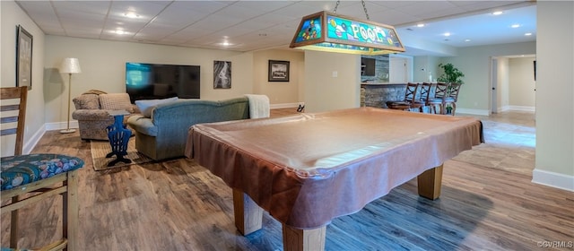 recreation room featuring wood finished floors, recessed lighting, baseboards, and pool table