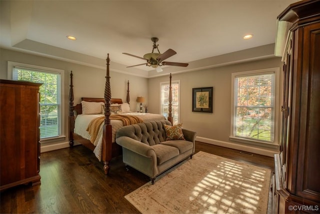 bedroom featuring recessed lighting, baseboards, and dark wood finished floors