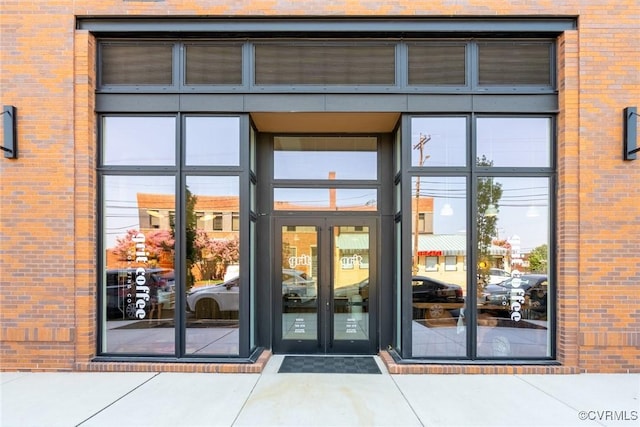 3436 Carlton St Unit 4-5B, Richmond, VA 23230 - view of exterior entry featuring brick siding and french doors