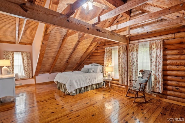bedroom featuring multiple windows, wooden ceiling, and lofted ceiling with beams