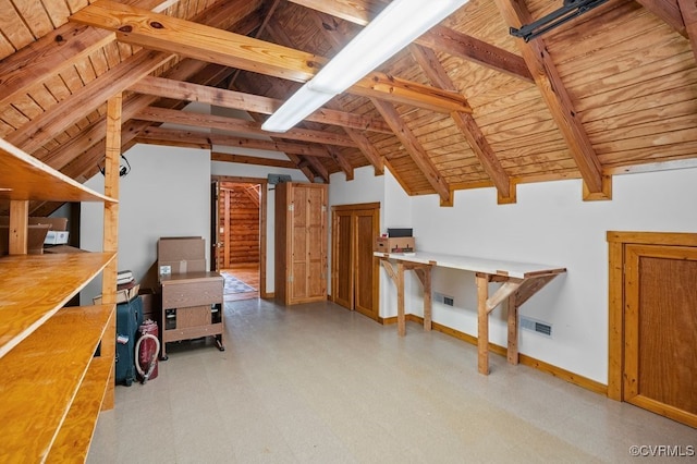 unfinished attic with visible vents
