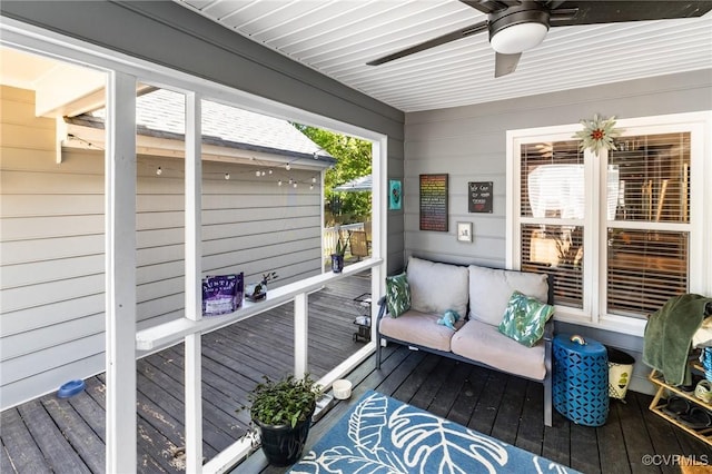 exterior space featuring ceiling fan