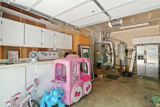 garage featuring stainless steel refrigerator with ice dispenser, a garage door opener, and water heater