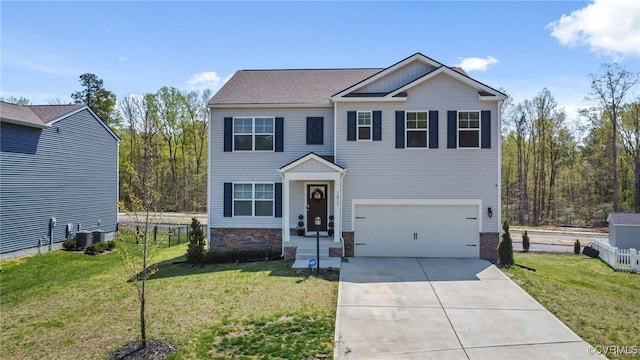 view of front of home with driveway, stone siding, a front yard, and a garage