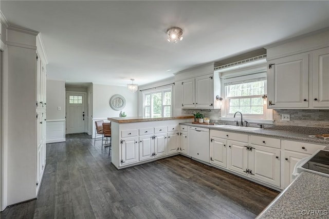12665 Petersburg St, Chester, VA 23831 - kitchen featuring a sink, white cabinetry, white appliances, and a peninsula