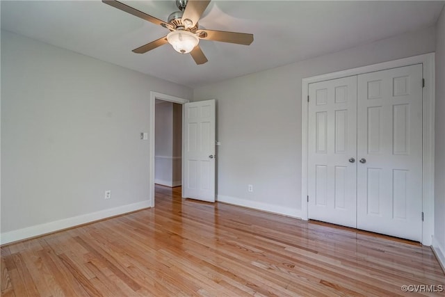 12665 Petersburg St, Chester, VA 23831 - unfurnished bedroom with a closet, light wood finished floors, baseboards, and ceiling fan