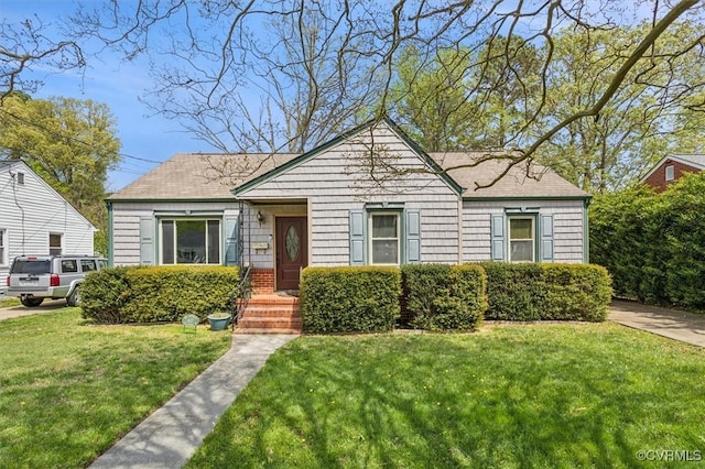 627 Sedgefield Dr, Newport News, VA 23605 - view of front facade featuring a front yard
