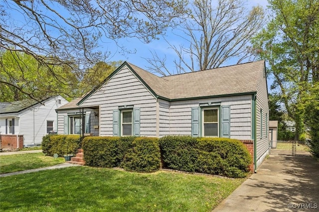 627 Sedgefield Dr, Newport News, VA 23605 - exterior space featuring a yard and a shingled roof