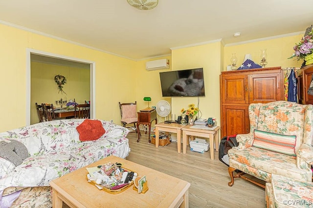 living area with crown molding, a wall mounted air conditioner, and light wood-type flooring