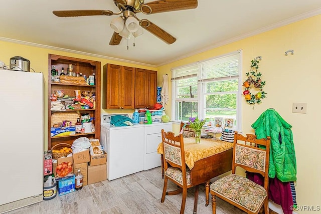 dining space with crown molding, ceiling fan, light wood-type flooring, and separate washer and dryer